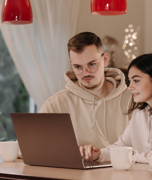 Man and woman Looking at a computer